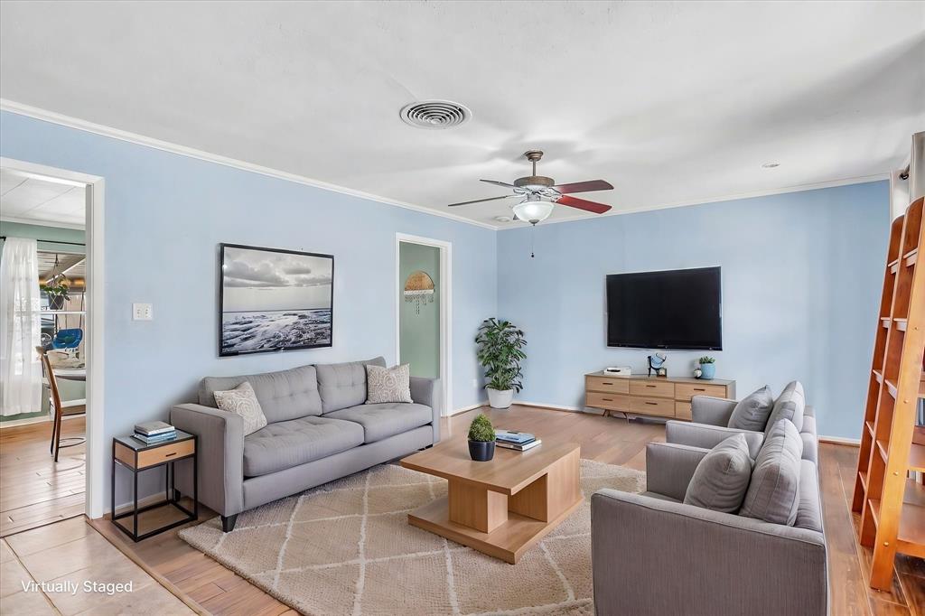 709 Hurstview Drive Hurst, TX 76053 - Photo 6 of 28 a living room with furniture and a flat screen tv