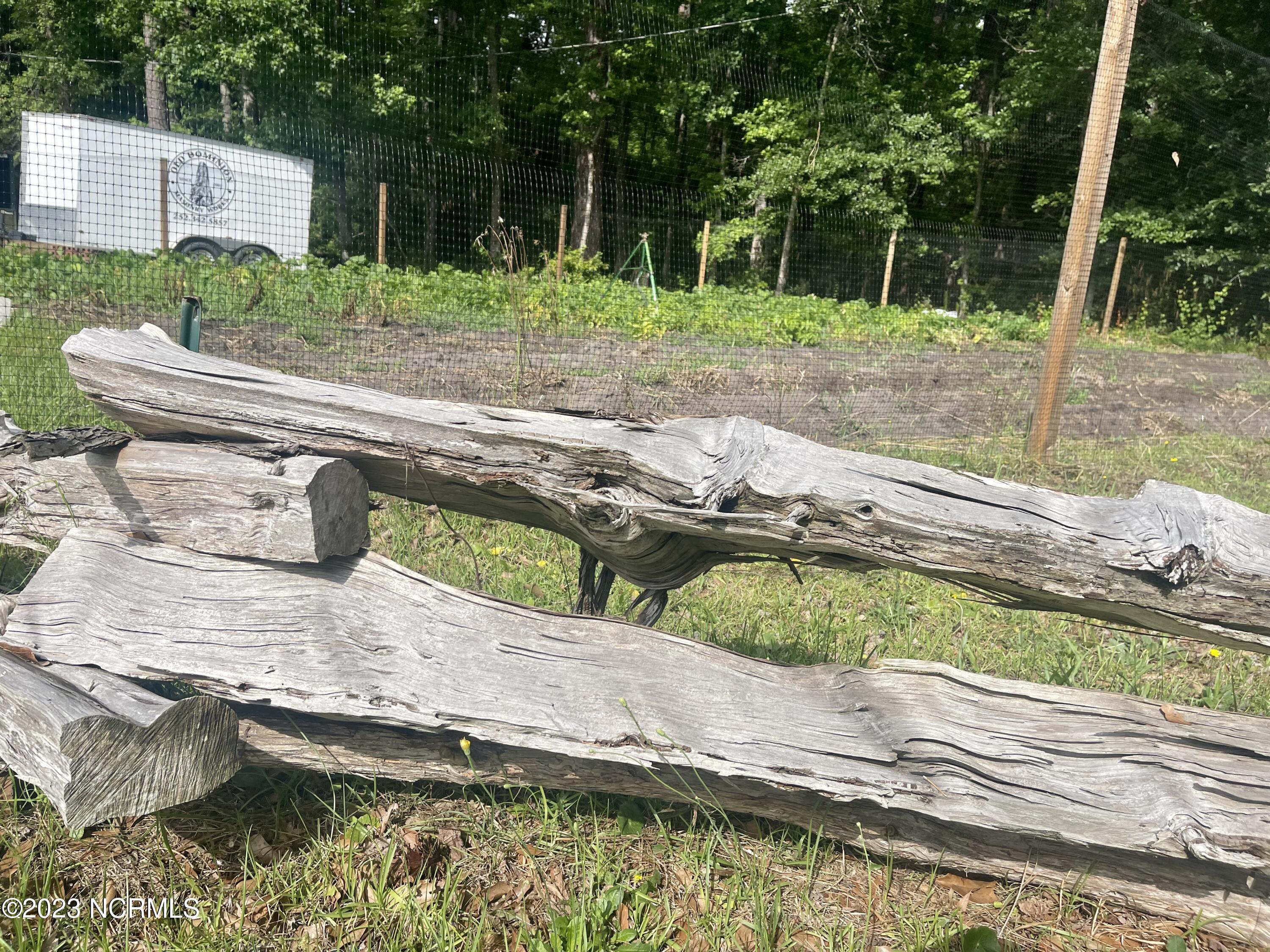 792 Roberts Road Newport, NC 28570 - Photo 52 of 52 spilt rail fencing in front of home