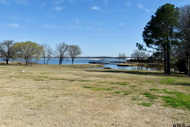 a view of a swimming pool and an outdoor space
