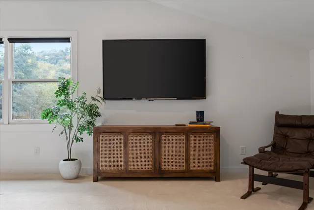 a bathroom with a sink vanity and mirror