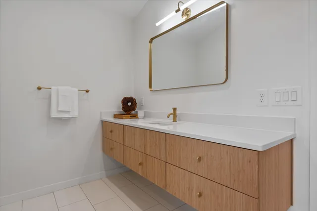 a view of a dining room with furniture and window