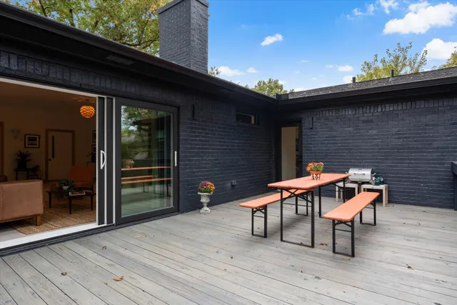an aerial view of residential house with outdoor space