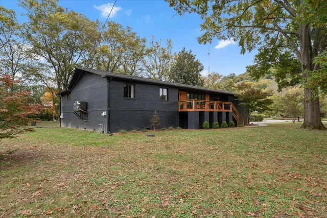 a view of a playground and basketball court
