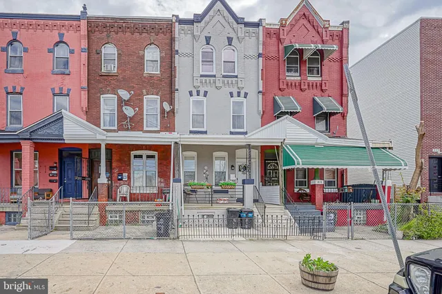 a view of a building with sitting area