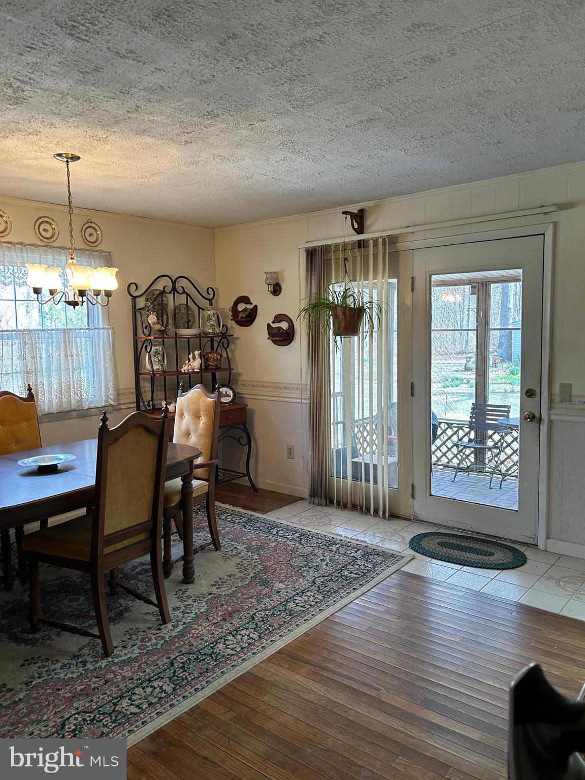 124 Karl Drive Dover, DE 19901 - Photo 14 of 58 a view of a livingroom with furniture window and wooden floor