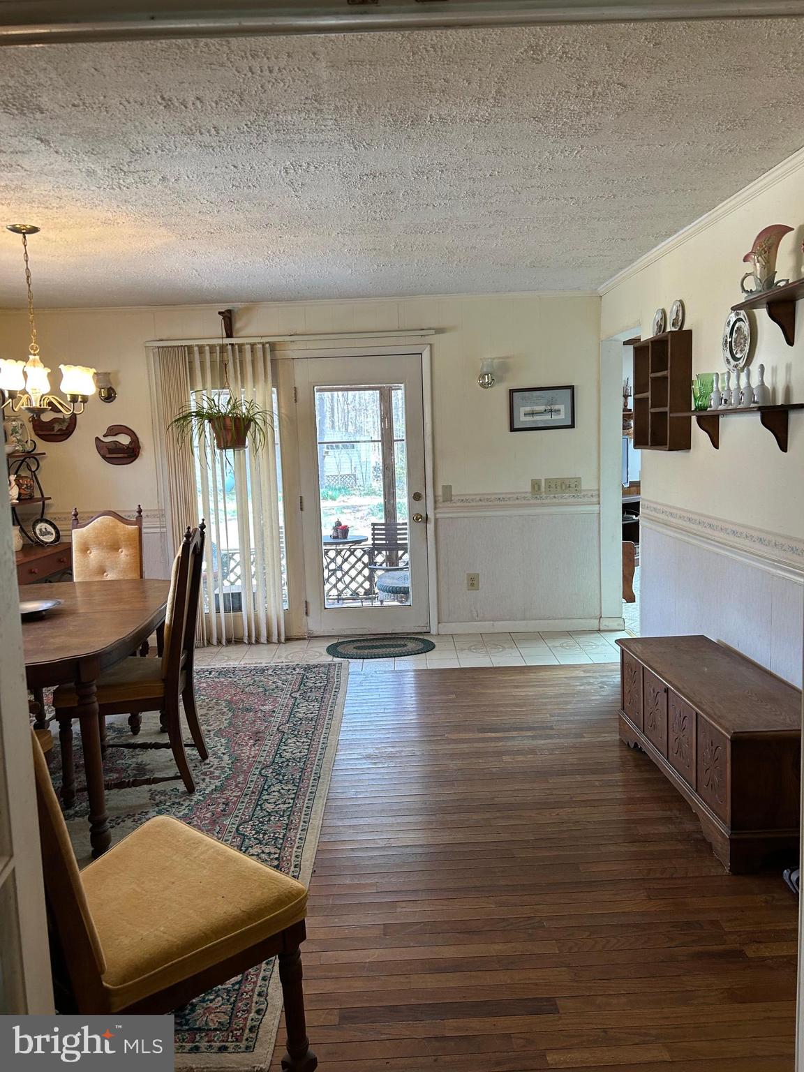 124 Karl Drive Dover, DE 19901 - Photo 15 of 58 a view of a dining room with furniture and wooden floor