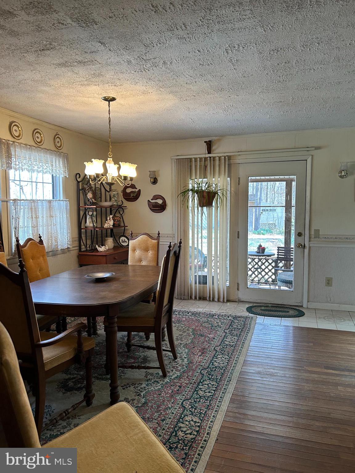 124 Karl Drive Dover, DE 19901 - Photo 17 of 58 a view of a dining room with furniture and wooden floor