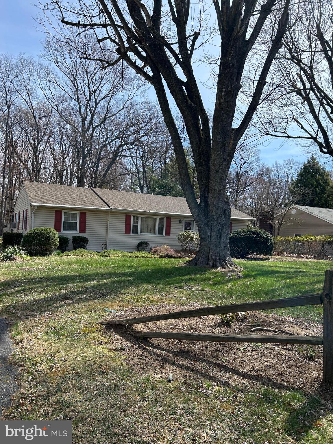 124 Karl Drive Dover, DE 19901 - Photo 2 of 58 a front view of a house with a yard