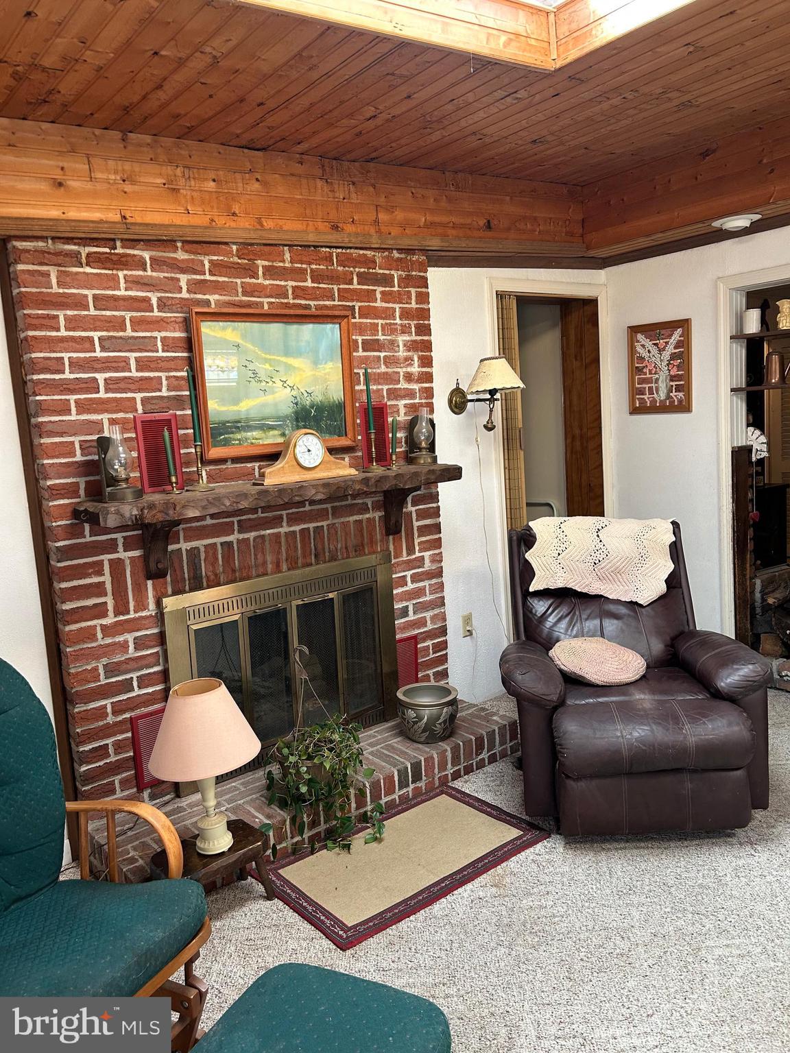 124 Karl Drive Dover, DE 19901 - Photo 22 of 58 a living room with furniture and a fireplace