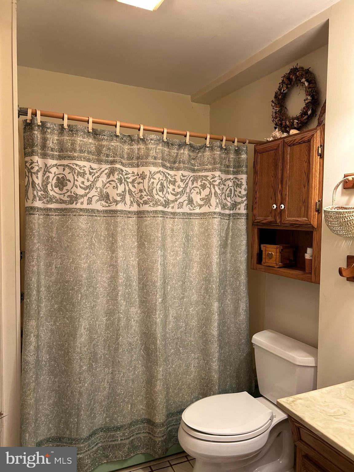 124 Karl Drive Dover, DE 19901 - Photo 44 of 58 a bathroom with a toilet and a sink