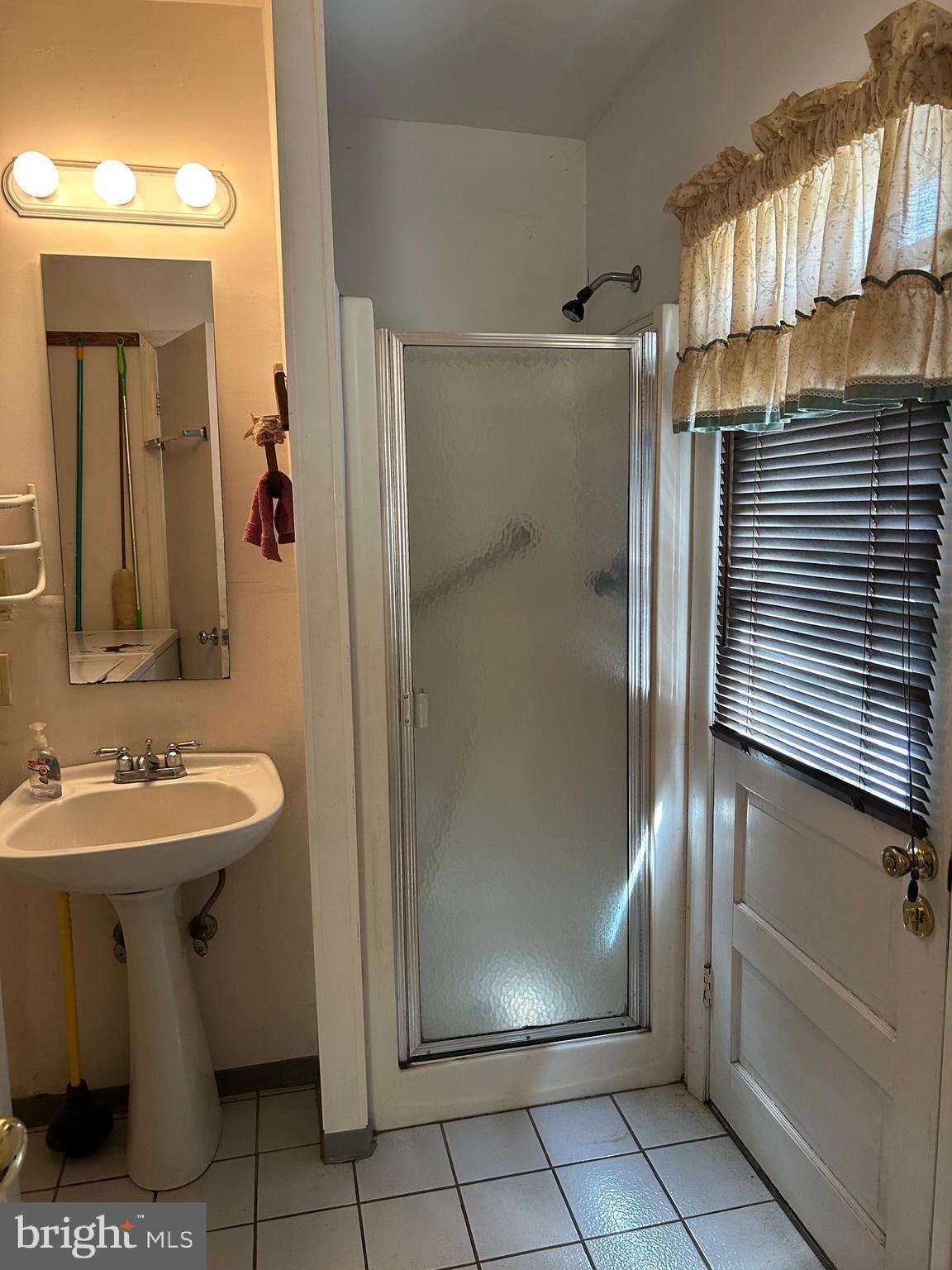 124 Karl Drive Dover, DE 19901 - Photo 46 of 58 a bathroom with a sink a toilet and shower