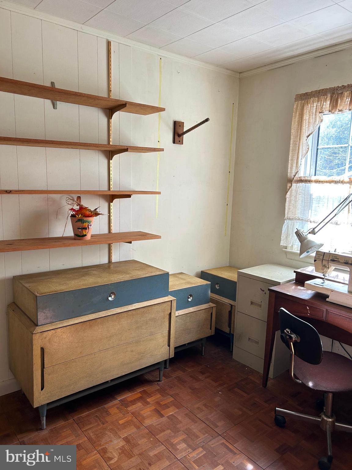 124 Karl Drive Dover, DE 19901 - Photo 48 of 58 a room with furniture a window and wooden floors