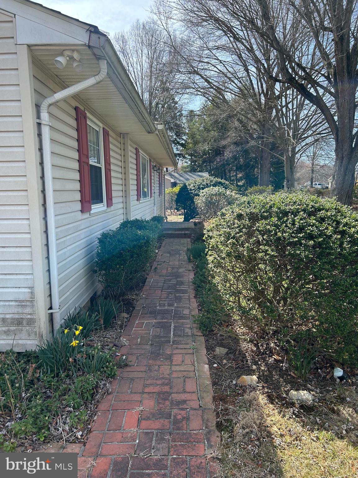 124 Karl Drive Dover, DE 19901 - Photo 5 of 58 a front view of a house with garden