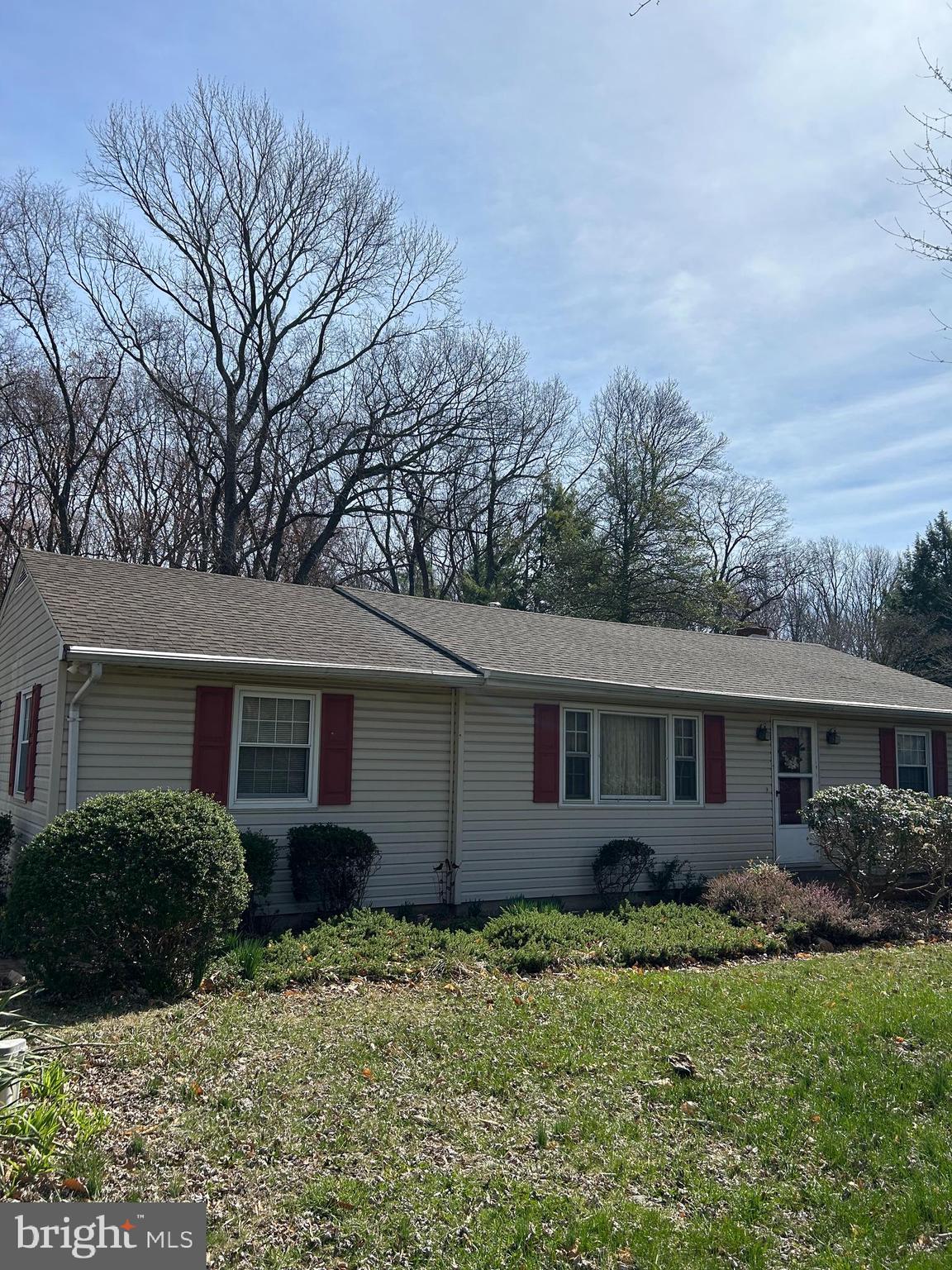 124 Karl Drive Dover, DE 19901 - Photo 56 of 58 a backyard of a house with plants and trees
