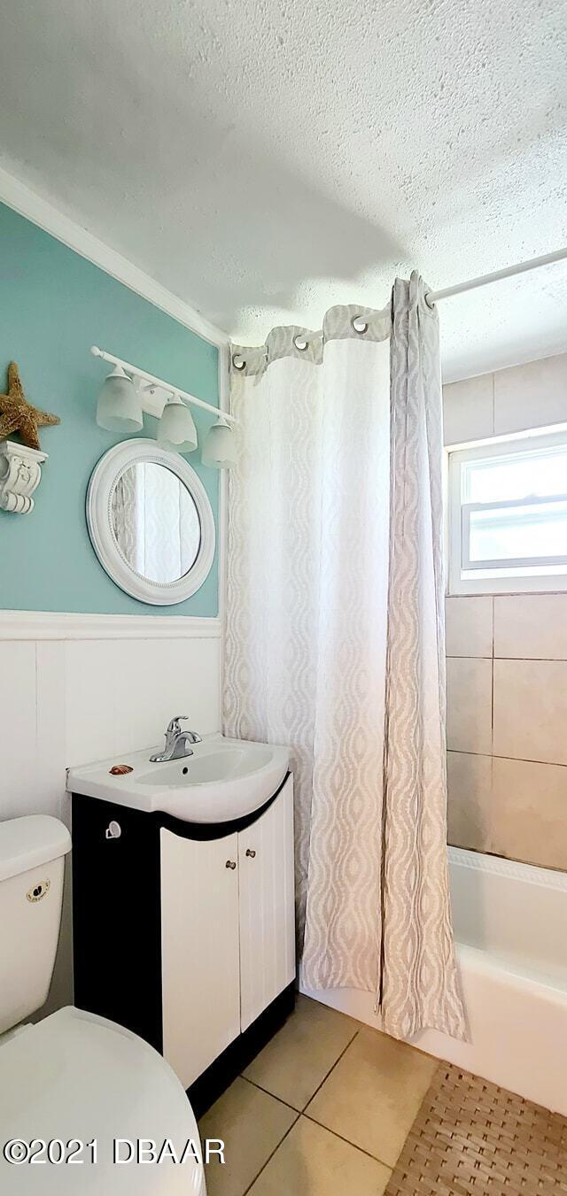 53 Seacrest Drive Ormond Beach, FL 32176 - Photo 15 of 34 a bathroom with a sink toilet and shower