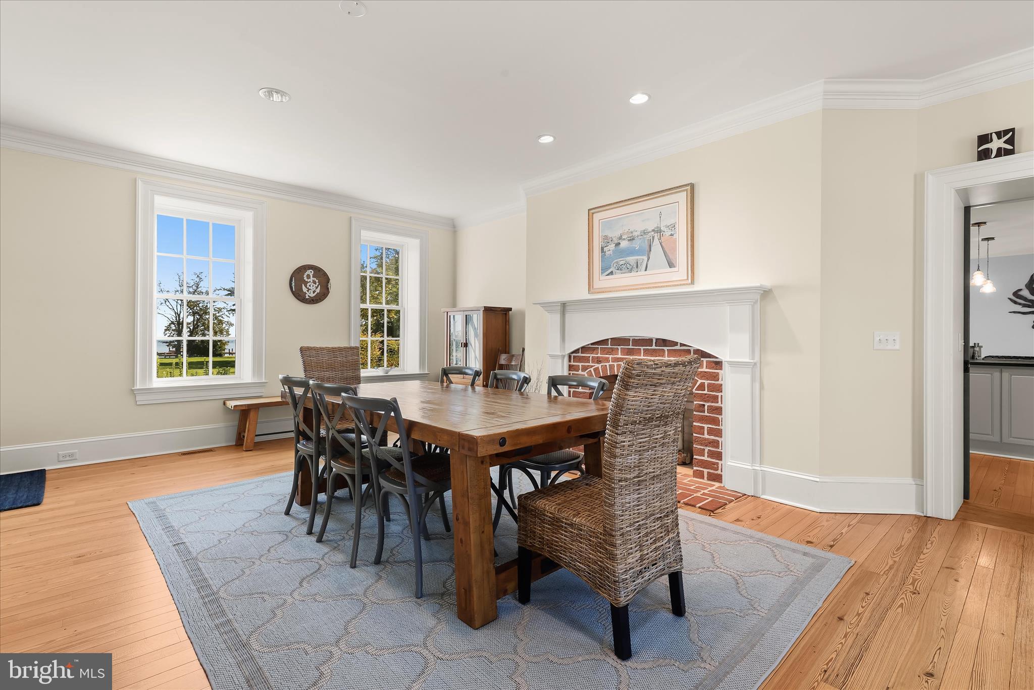 122 Queen Anne Road Stevensville, MD 21666 - Photo 32 of 100 Dining Room w Waterside Views and 2-Sided brick Fi