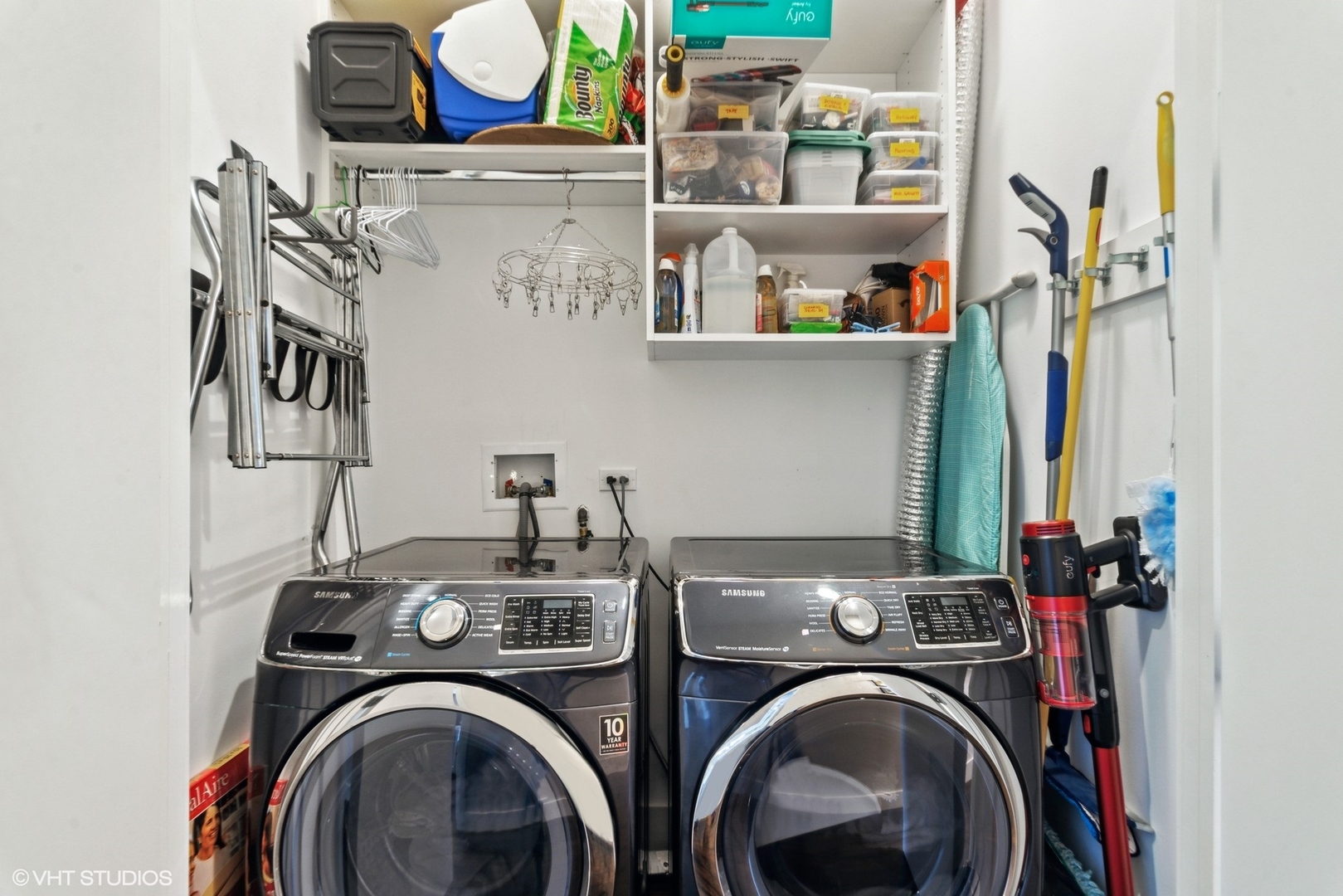1116 West Adams Street, Unit PHW Chicago, IL 60607 - Photo 17 of 18 a utility room with dryer and washer
