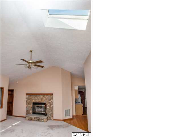 14 Amethyst Road Palmyra, VA 22963 - Photo 3 of 24 a picture of a living room with a fireplace