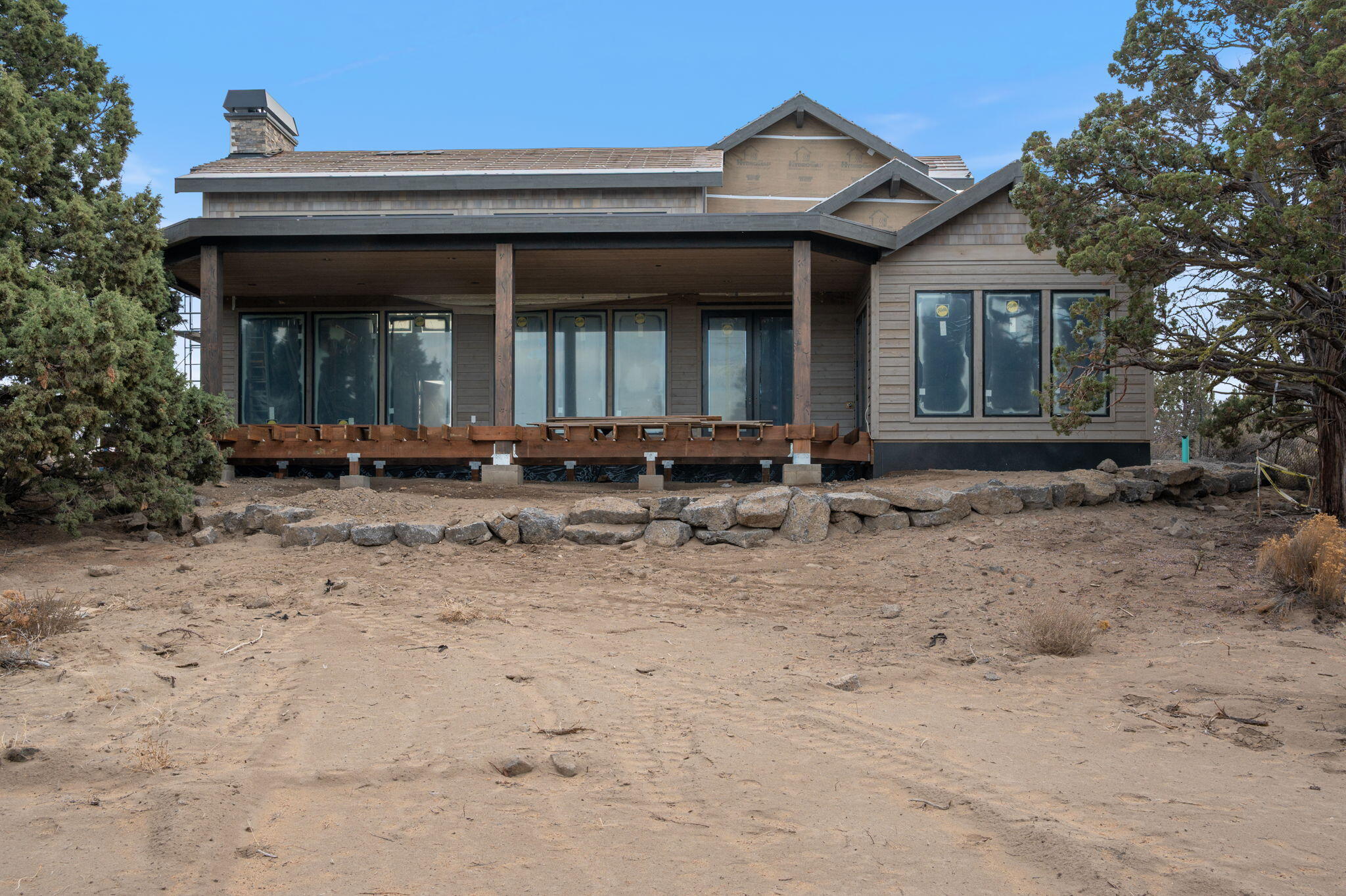 22936 Ghost Tree Lane Bend, OR 97701 - Photo 34 of 74 a front view of a house with sitting area