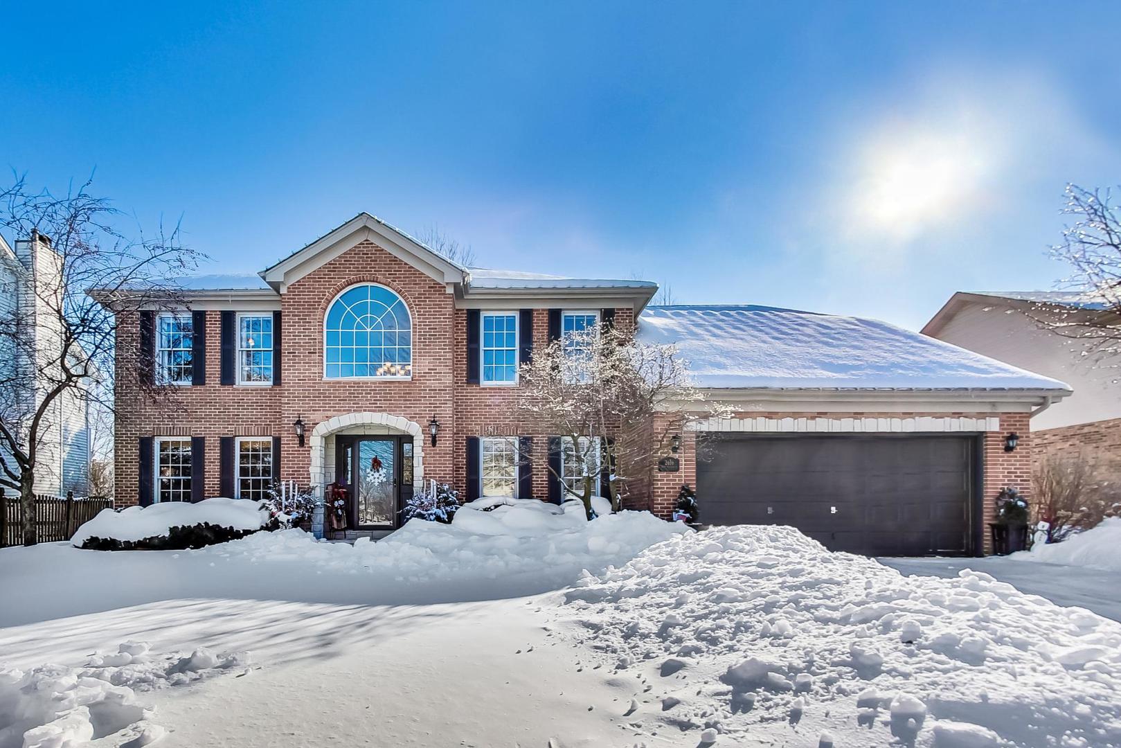 2616 High Meadow Road Naperville, IL 60564 - Photo 2 of 47 a front view of a house with a yard