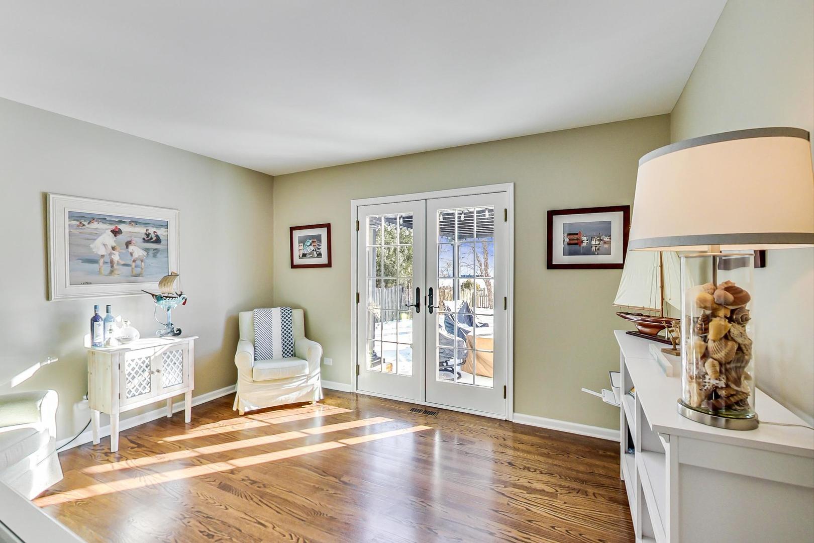 2616 High Meadow Road Naperville, IL 60564 - Photo 15 of 47 a living room with furniture and wooden floor