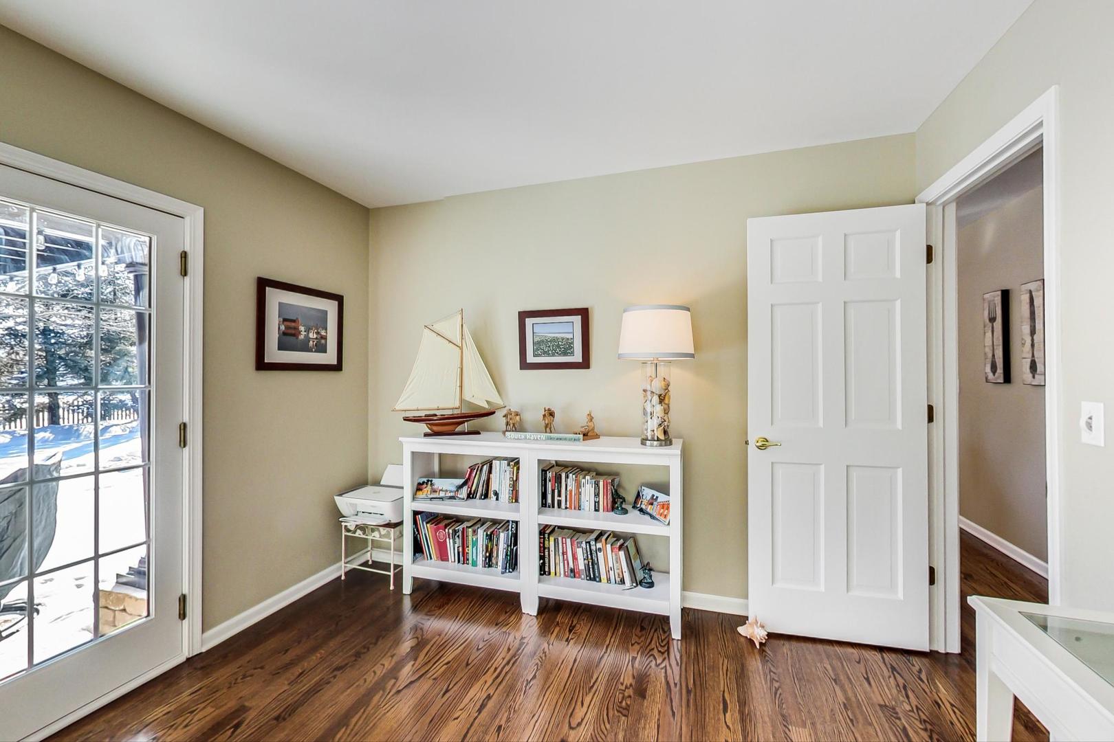 2616 High Meadow Road Naperville, IL 60564 - Photo 16 of 47 a room with furniture and a wooden floor