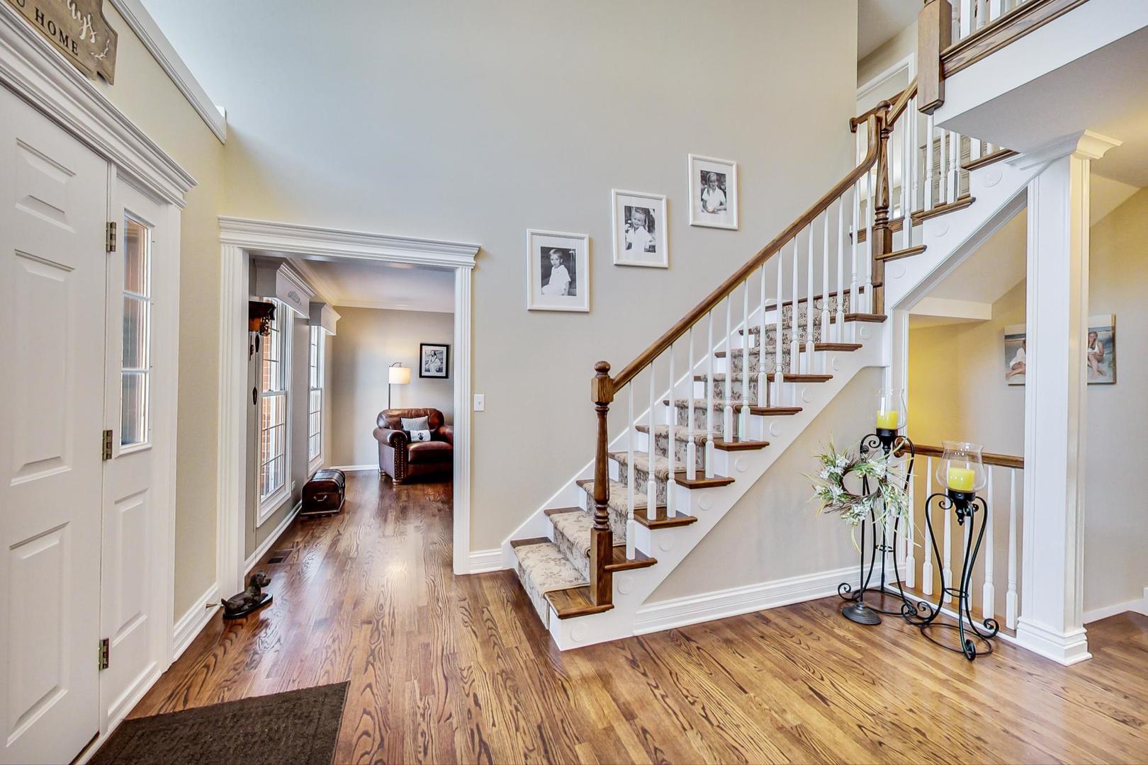 2616 High Meadow Road Naperville, IL 60564 - Photo 17 of 47 a view of entryway and hall with wooden floor
