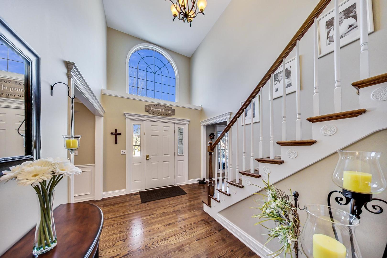 2616 High Meadow Road Naperville, IL 60564 - Photo 18 of 47 a view of an entryway with wooden floor