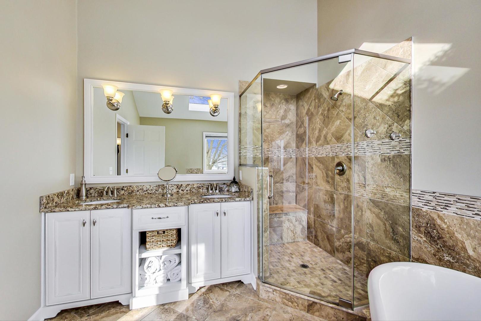2616 High Meadow Road Naperville, IL 60564 - Photo 22 of 47 a bathroom with a granite countertop sink a toilet and shower