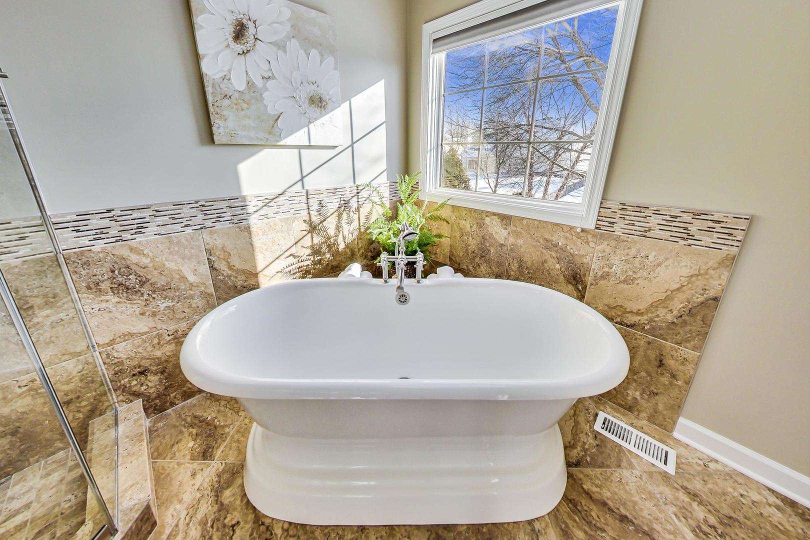 2616 High Meadow Road Naperville, IL 60564 - Photo 23 of 47 a bathroom with a sink and a mirror