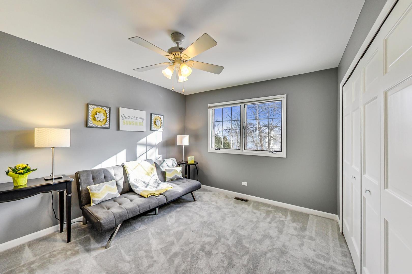 2616 High Meadow Road Naperville, IL 60564 - Photo 26 of 47 a living room with furniture and a window