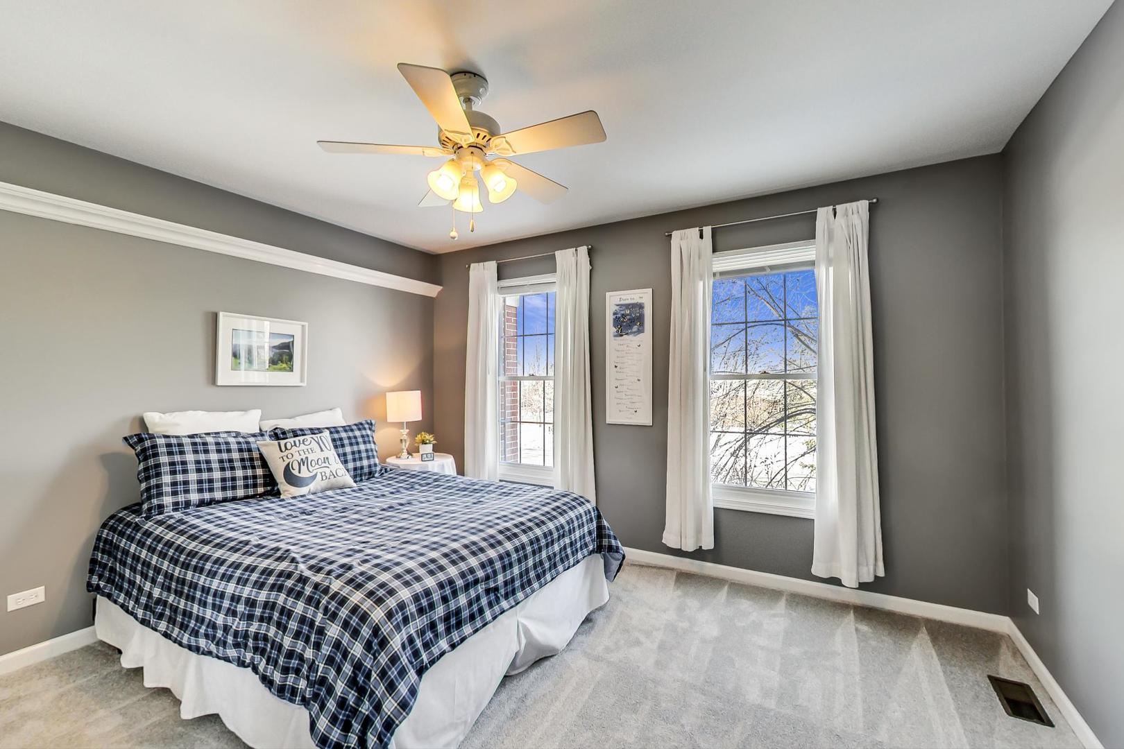 2616 High Meadow Road Naperville, IL 60564 - Photo 28 of 47 a bedroom with a bed and window