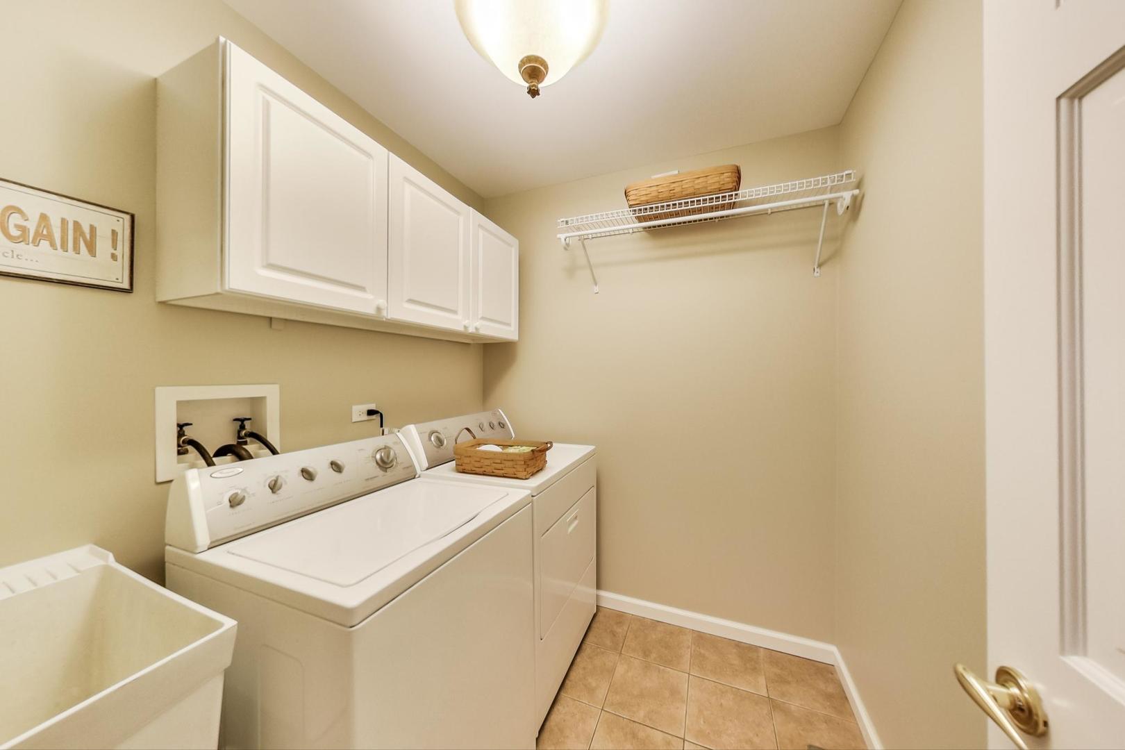 2616 High Meadow Road Naperville, IL 60564 - Photo 31 of 47 a utility room with dryer and washer