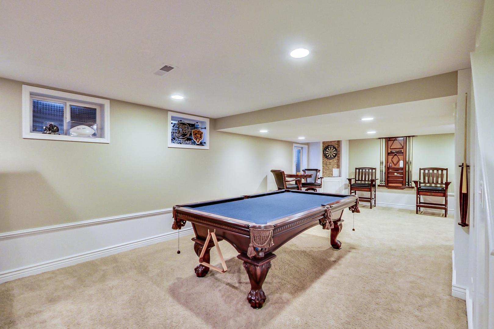 2616 High Meadow Road Naperville, IL 60564 - Photo 32 of 47 a room with furniture and air hockey table