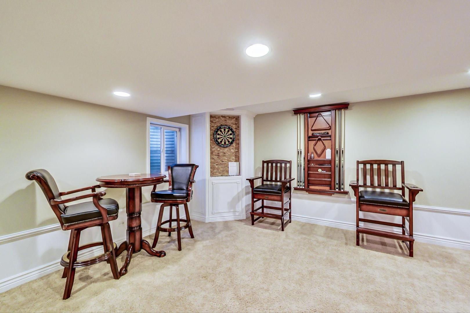 2616 High Meadow Road Naperville, IL 60564 - Photo 34 of 47 a view of a livingroom with furniture and staircase