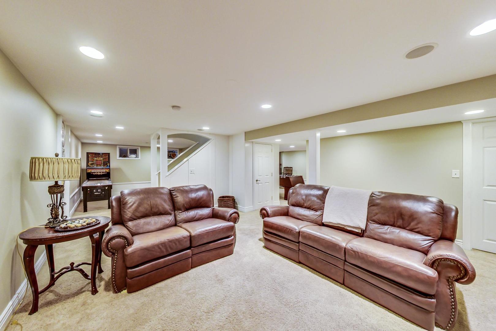 2616 High Meadow Road Naperville, IL 60564 - Photo 36 of 47 a living room with furniture and a couch