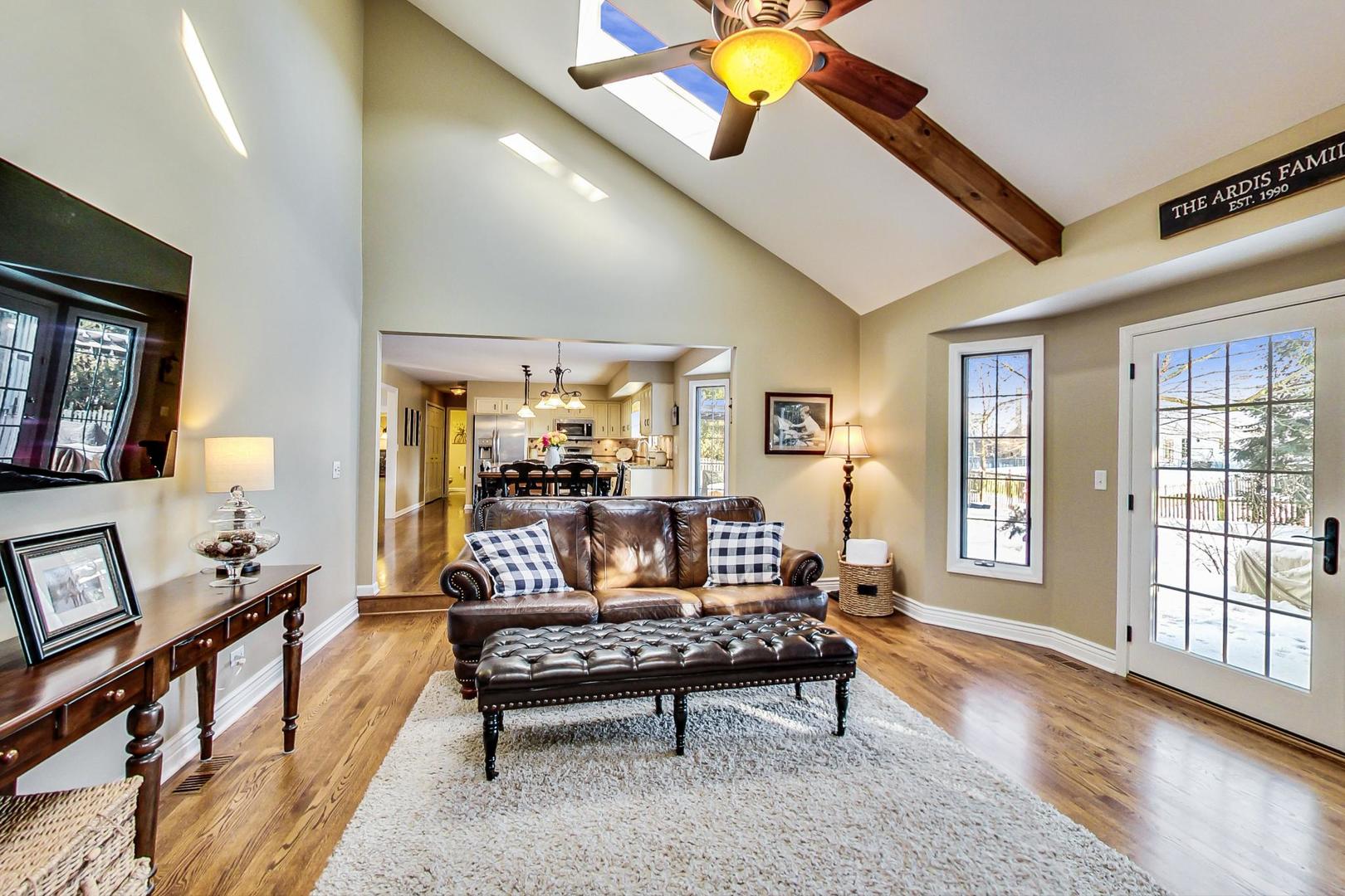 2616 High Meadow Road Naperville, IL 60564 - Photo 10 of 47 a living room with furniture and a window