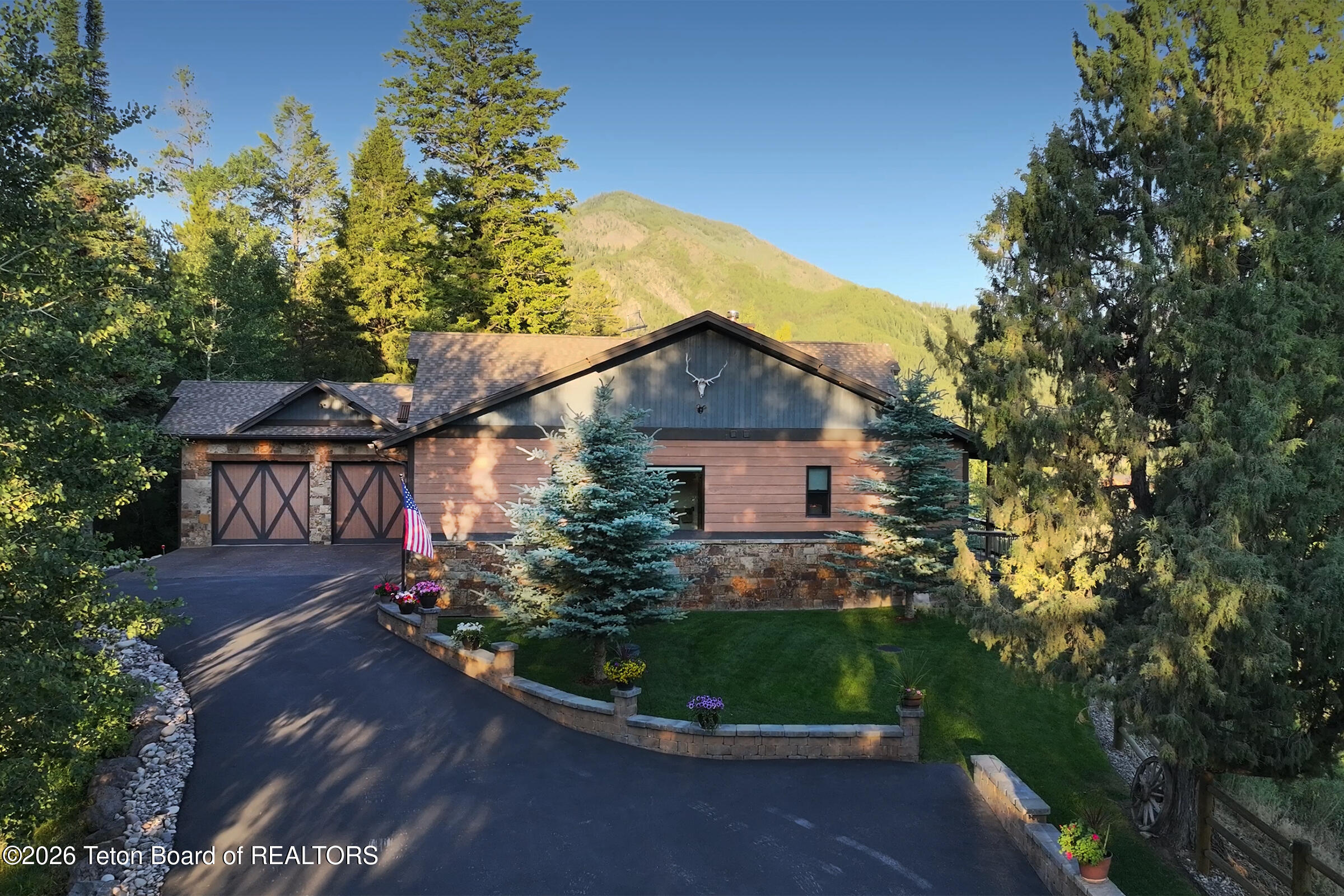 166 Aspen Ridge Trail Alpine, WY 83128 - Photo 46 of 50 4_166_Aspen_Ridge_Trail_DroneSIDE