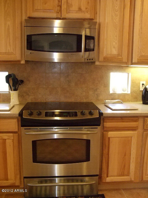377 South Prospectors Road Apache Junction, AZ 85119 - Photo 31 of 43 GE PROFILE SMOOTH TOP RANGE/OVEN