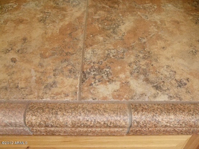 377 South Prospectors Road Apache Junction, AZ 85119 - Photo 37 of 43 TILE ON MASTER BATH COUNTERS