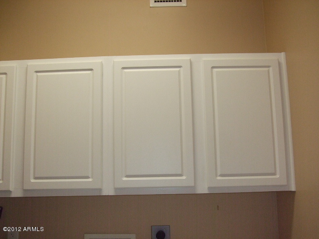 377 South Prospectors Road Apache Junction, AZ 85119 - Photo 42 of 43 CABINETS IN LAUNDRY ROOM