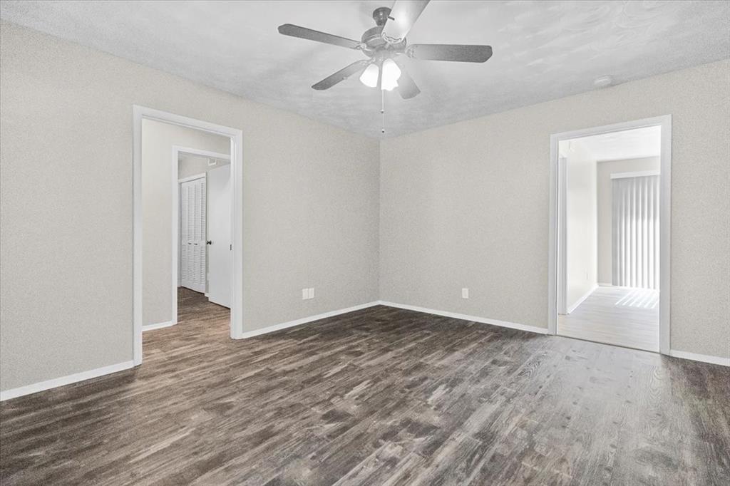 1251 Donna Drive Richardson, TX 75080 - Photo 12 of 39 wooden floor in an empty room