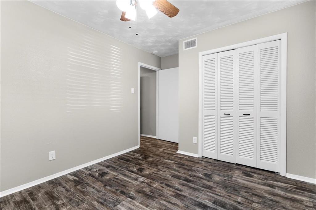 1251 Donna Drive Richardson, TX 75080 - Photo 23 of 39 wooden floor in an empty room