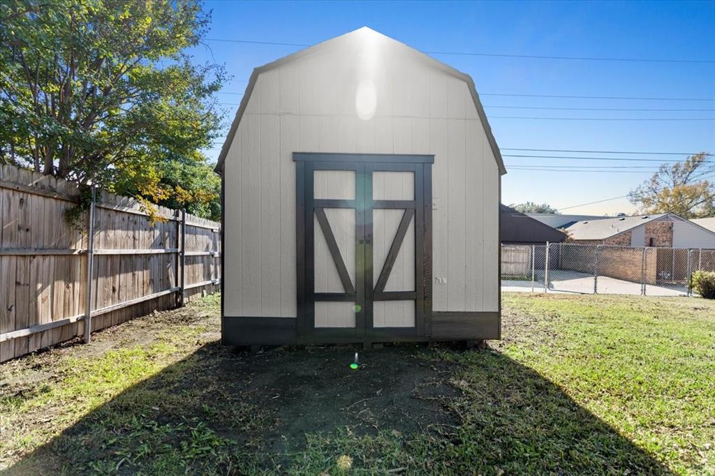 1251 Donna Drive Richardson, TX 75080 - Photo 30 of 39 a view of a backyard