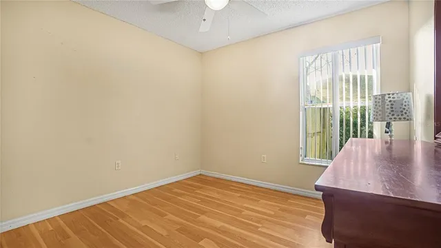 a room with a dresser and a mirror