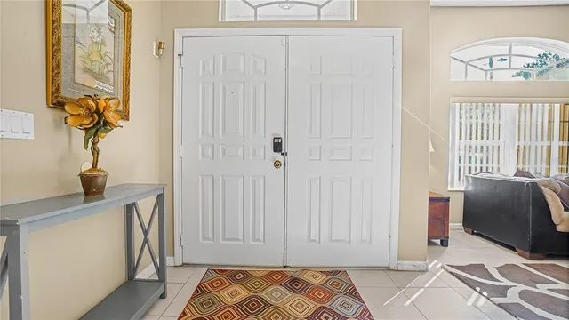 a view of bedroom with furniture and windows