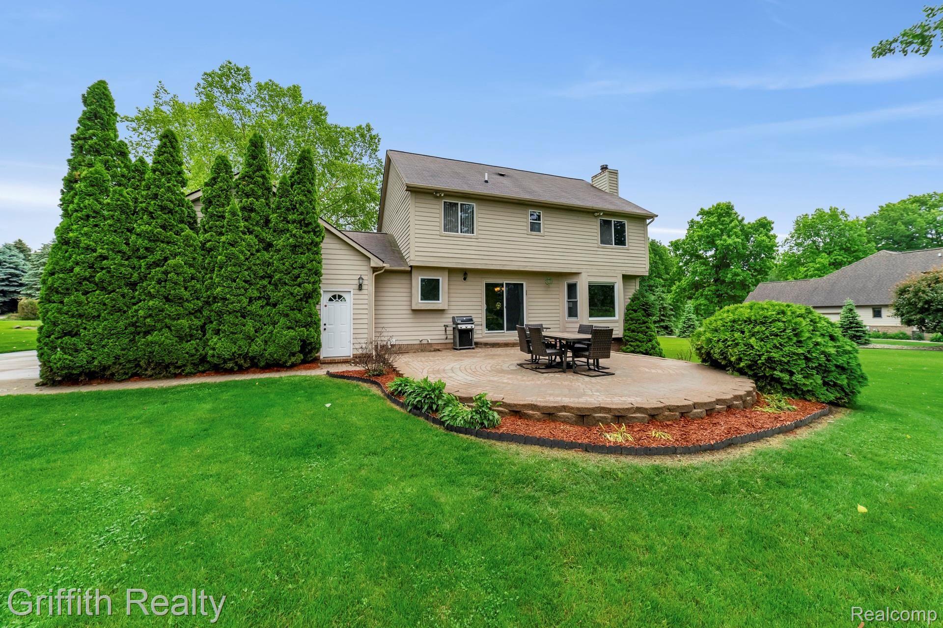 1899 Clover Ridge Drive Howell, MI 48843 - Photo 25 of 28 024-photo-rear-view-7163802.jpg