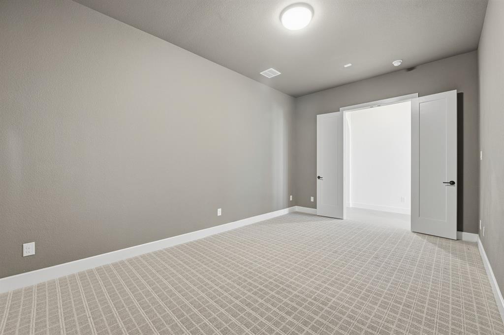 3700 Meander Way Prosper, TX 75078 - Photo 26 of 29 a view of an empty room with wooden floor