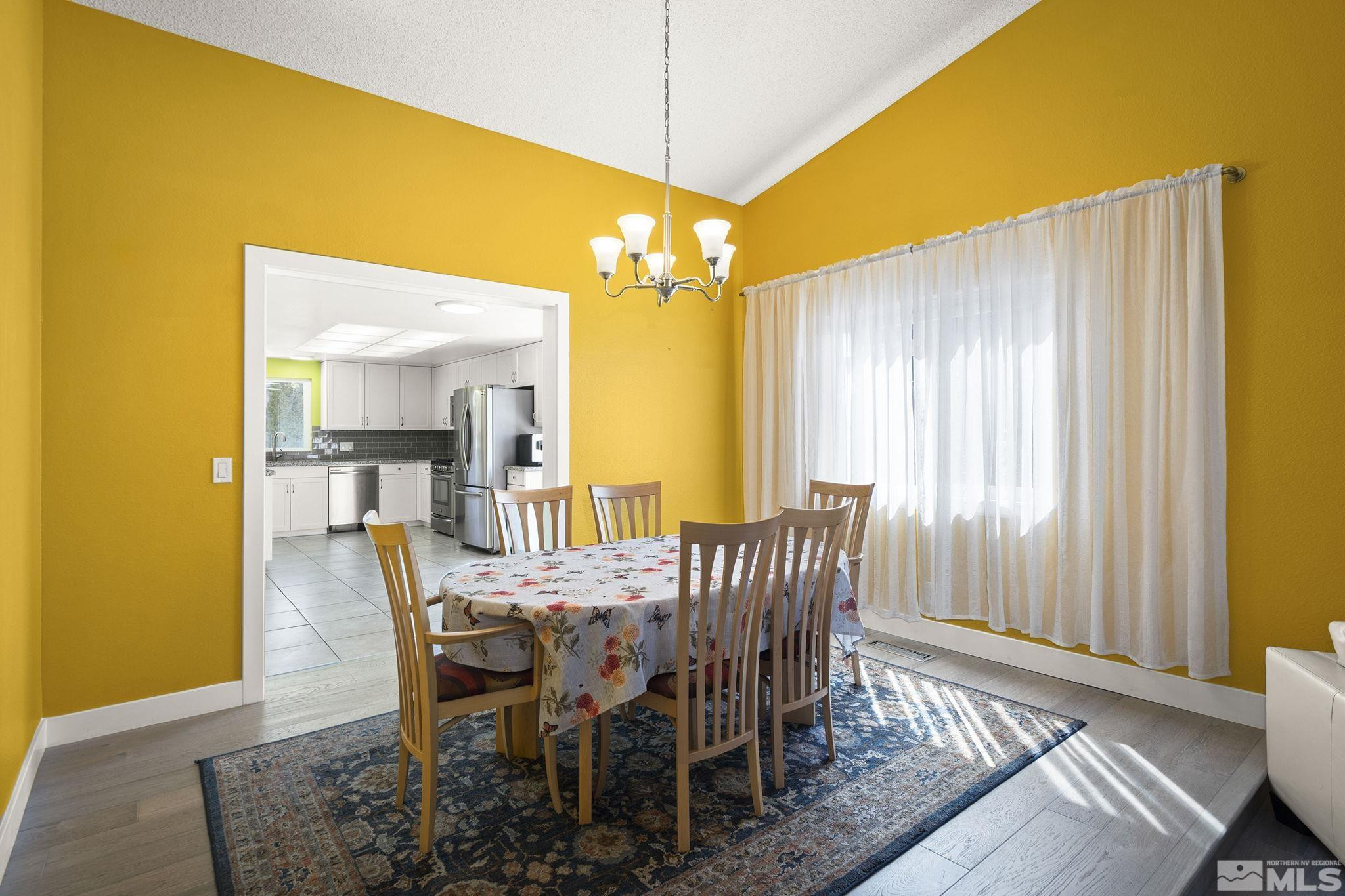 920 Pinebrook Road Reno, NV 89509 - Photo 19 of 40 a view of a dining room with furniture and window
