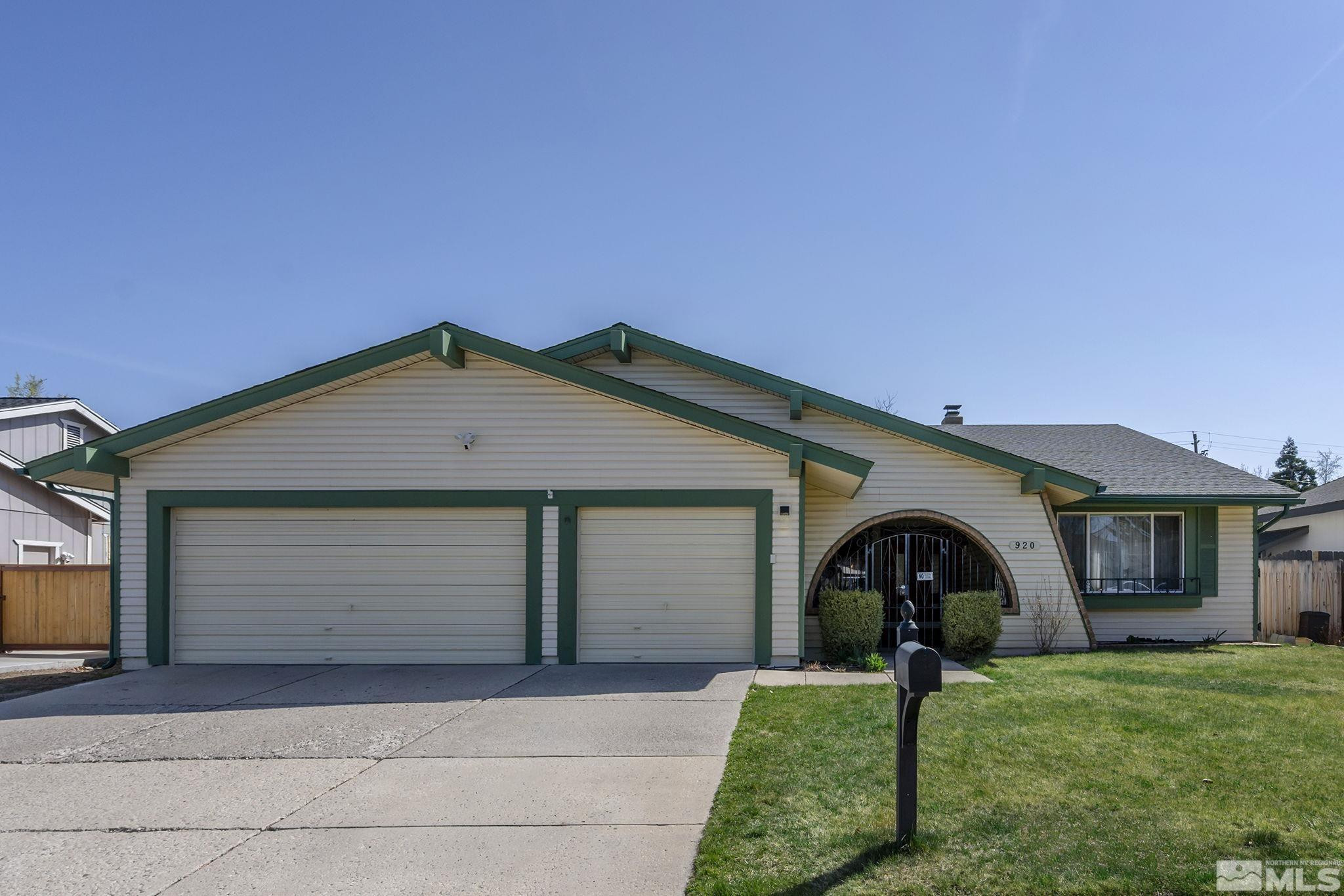 920 Pinebrook Road Reno, NV 89509 - Photo 2 of 40 a front view of a house with garden